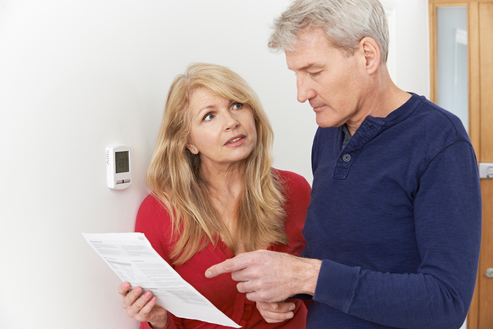 Married Couple Looking at Energy Bill