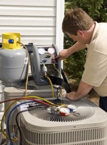 Technician showing how to fix your need AC repairs