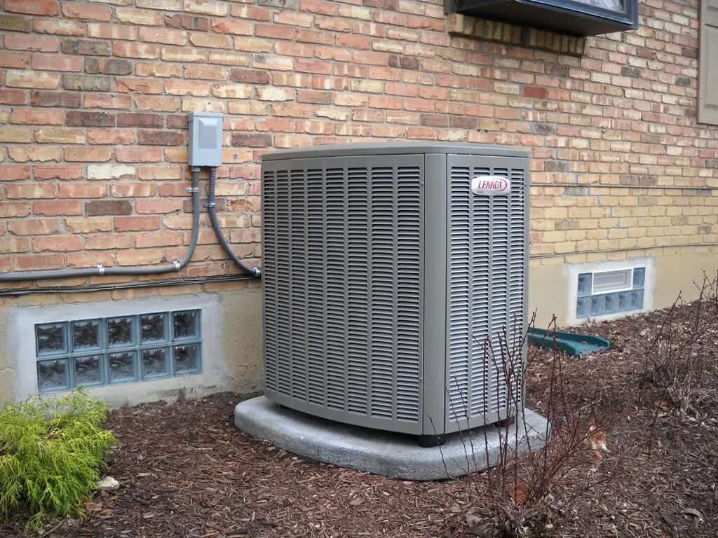 Lennox AC system installation outside a residential home